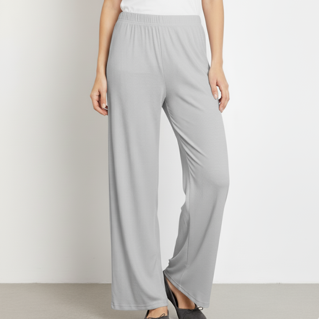 Light gray wide-leg pants worn by a person on a plain background