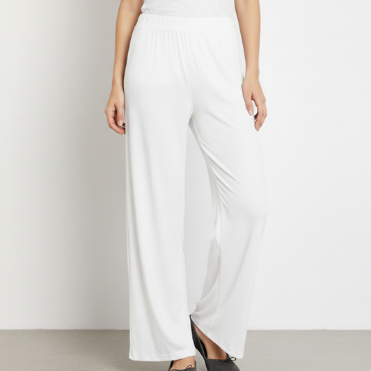White wide-leg pants worn by a person on a plain background
