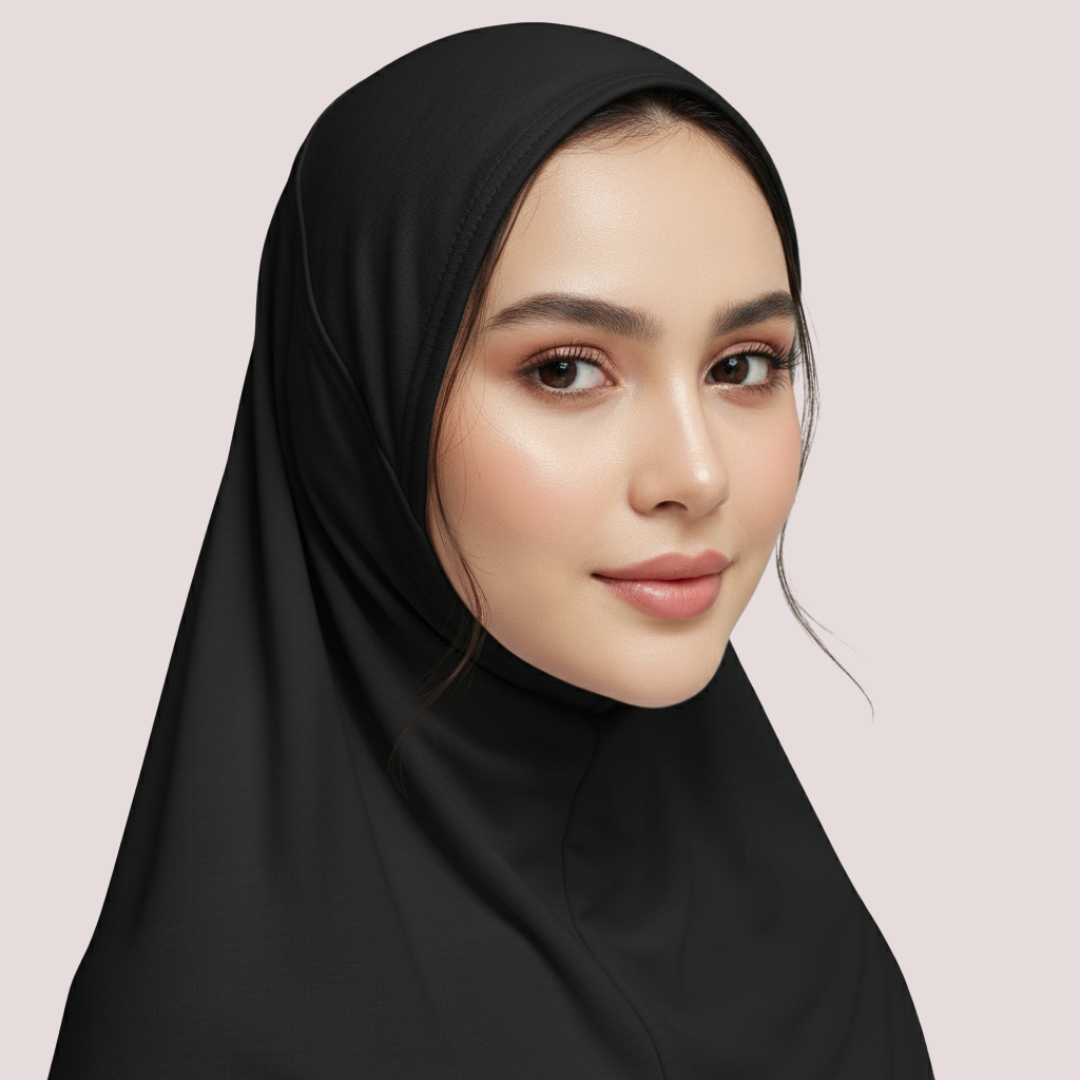 Woman wearing a black hijab against a light pink background